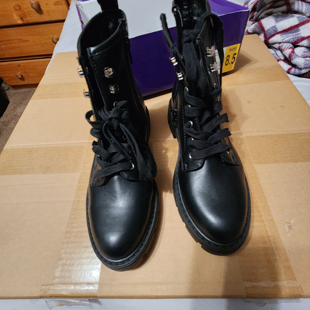 Black Combat Boots with Silver Accents